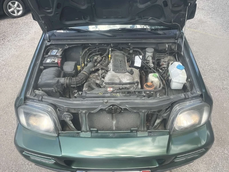 Suzuki Jimny, снимка 9 - Автомобили и джипове - 52015773