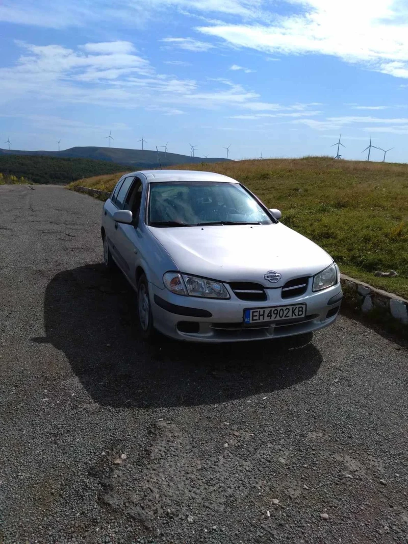 Nissan Almera 1.5, снимка 4 - Автомобили и джипове - 48103538