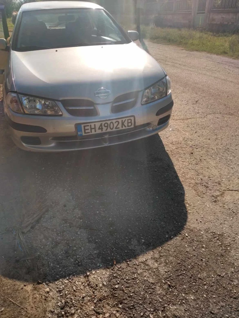 Nissan Almera 1.5, снимка 3 - Автомобили и джипове - 48103538