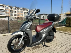 ������ Kymco People