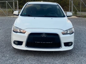 Mitsubishi Lancer 1.8i face navi - изображение 1