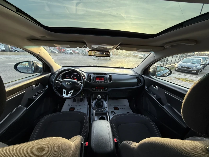 Kia Sportage 1.6i Панорама, снимка 12 - Автомобили и джипове - 52909909