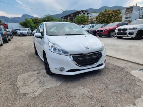 Peugeot 208 1.2I, снимка 9