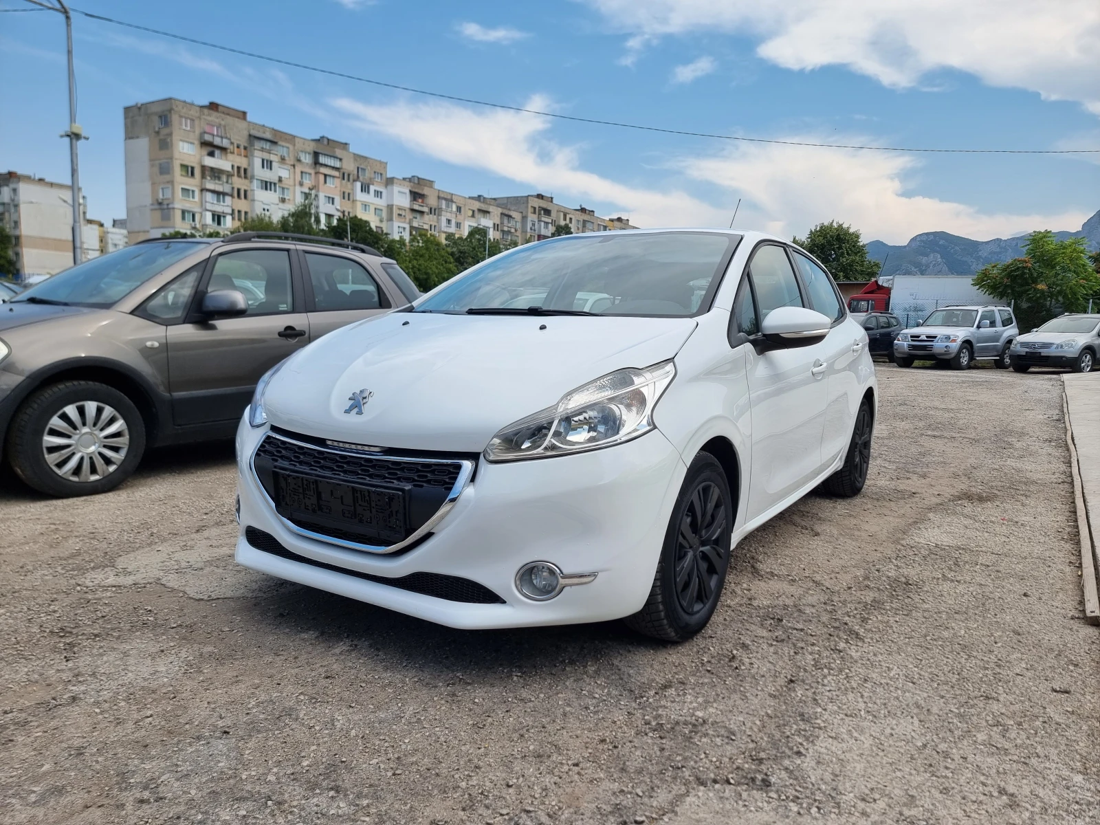 Peugeot 208 1.2I - изображение 2