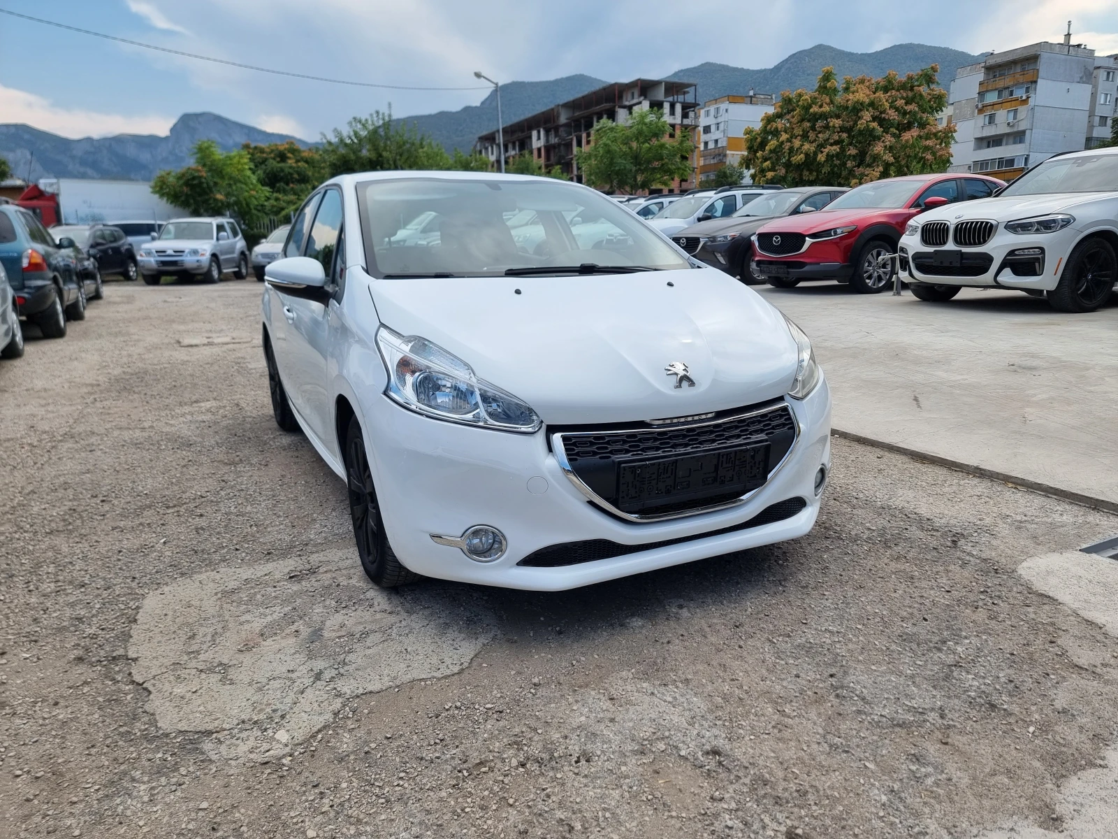 Peugeot 208 1.2I - изображение 9