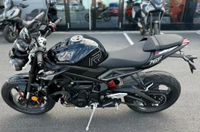 ������ Triumph Street Tripl...