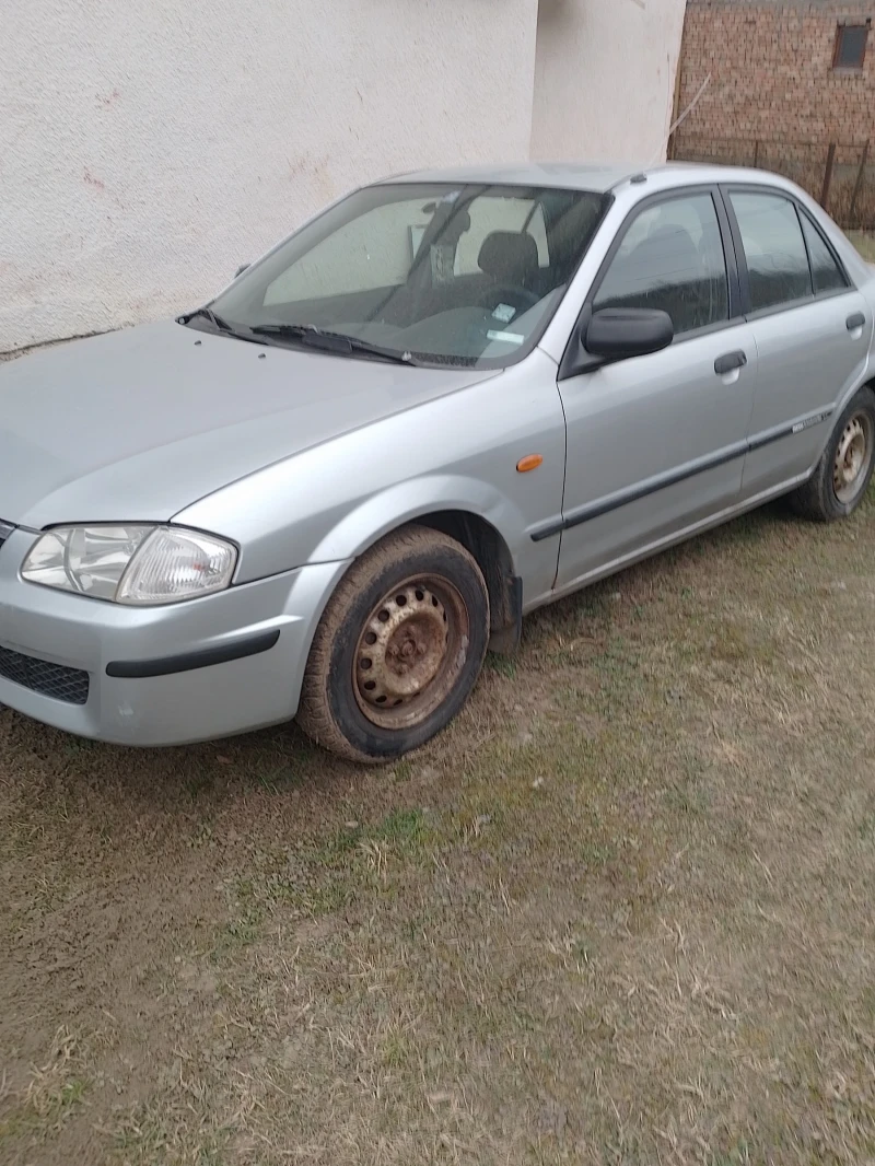 Mazda 323, снимка 1 - Автомобили и джипове - 49335437