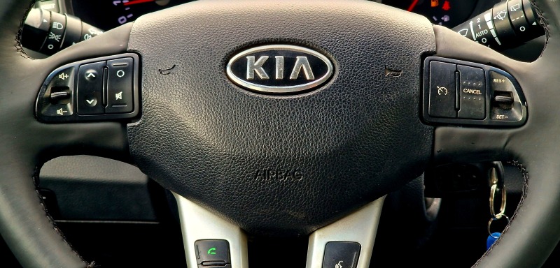 Kia Sportage, снимка 12 - Автомобили и джипове - 45980572