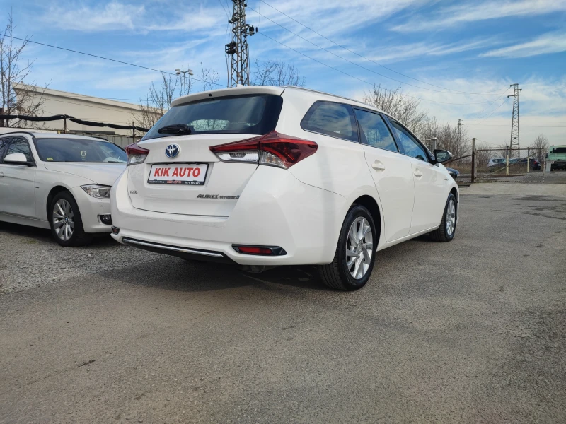 Toyota Auris 1.8 HYBRID-99ks, снимка 6 - Автомобили и джипове - 52825069