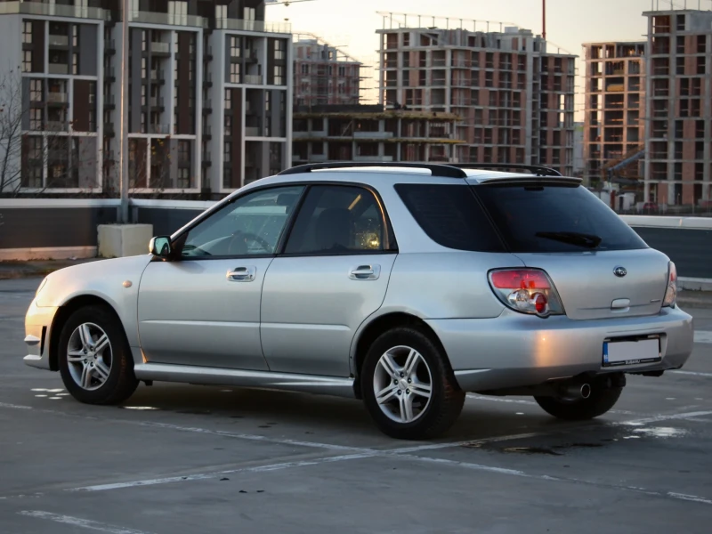 Subaru Impreza 2.0R 160кс, снимка 4 - Автомобили и джипове - 52843806