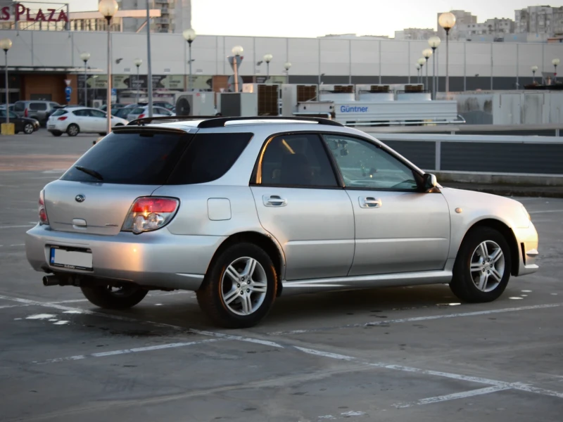 Subaru Impreza 2.0R 160кс, снимка 5 - Автомобили и джипове - 52843806
