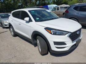 Hyundai Tucson 2.0L I-4 DI, DOHC, VVT, 161HP All Wheel Drive
