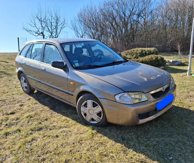 Mazda 323 F, снимка 1 - Автомобили и джипове - 49452350