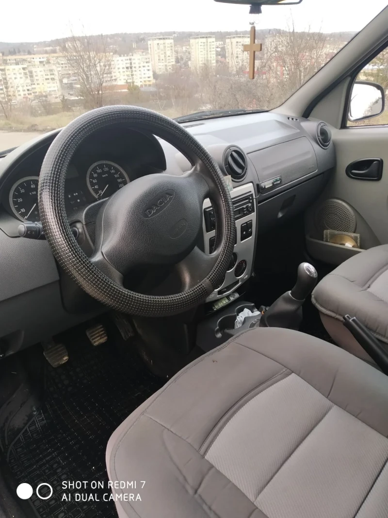 Dacia Logan, снимка 4 - Автомобили и джипове - 49609378