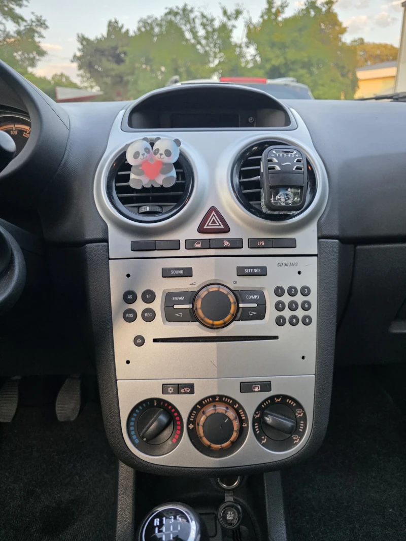 Opel Corsa 2012г LPG, снимка 9 - Автомобили и джипове - 52741161