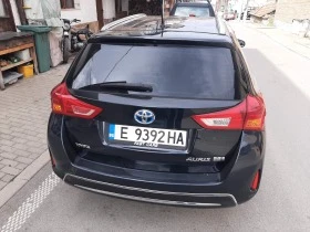 Toyota Auris 1.8 Hibrid ГАЗ, снимка 8