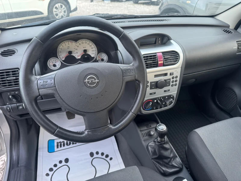Opel Corsa 1.2i KLIMA 97000км, снимка 11 - Автомобили и джипове - 52402264
