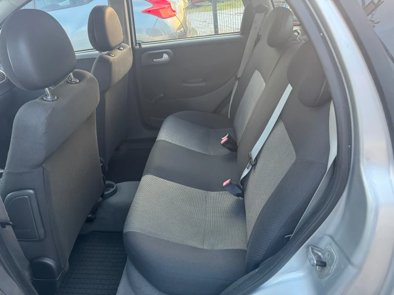 Opel Corsa 1.2i KLIMA 97000км, снимка 13 - Автомобили и джипове - 52402264