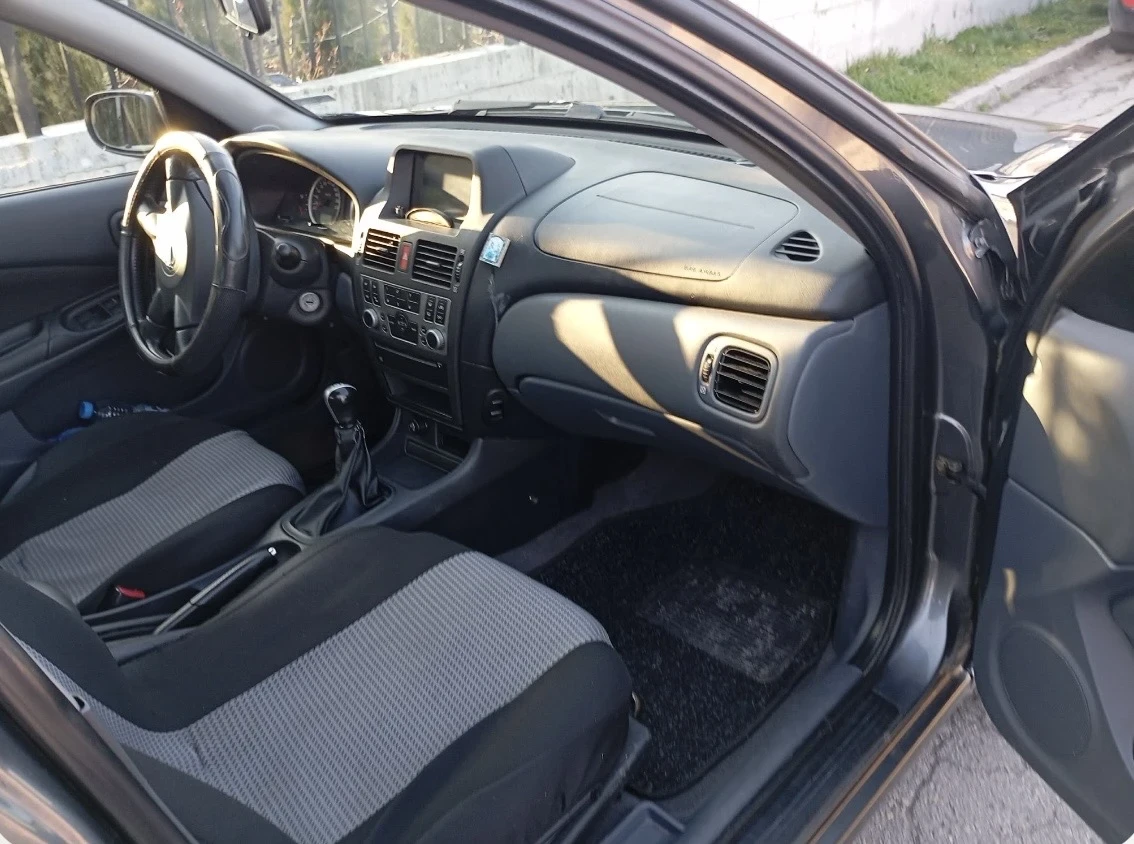 Nissan Almera, снимка 5 - Автомобили и джипове - 53998855