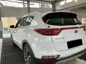 Kia Sportage 2.0CRDi Platinum Edition 4WD/Сервизна история - 21900 € / 42832.68 лв. - 95592588 2
