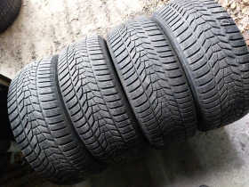 Гуми Зимни 235/55R18, снимка 1 - Гуми и джанти - 48791842