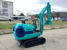 Багер Komatsu PC12R, снимка 6