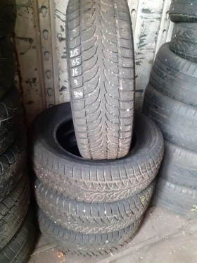 Гуми Зимни 215/65R16, снимка 1 - Гуми и джанти - 43786878