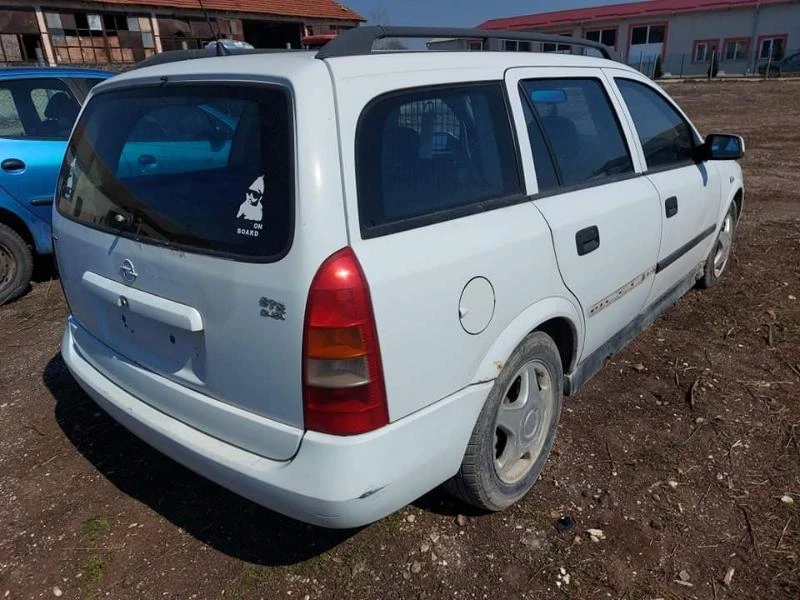 Opel Astra 2.0 дизел , снимка 8 - Автомобили и джипове - 36334224