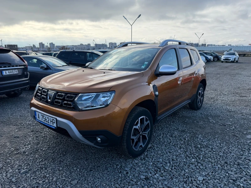 Dacia Duster 1.6i Газ-Бензин, снимка 1 - Автомобили и джипове - 48275792