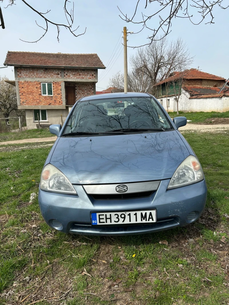 Suzuki Liana, снимка 8 - Автомобили и джипове - 49608704