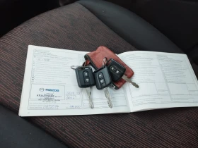 Nissan Note 1.4i 88 kc., снимка 14