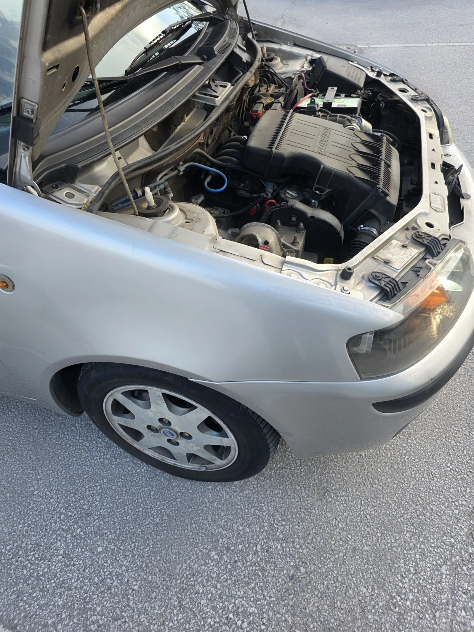 Fiat Punto 1.2i Klima/Gaz , снимка 11 - Автомобили и джипове - 54416008