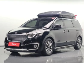 ������ Kia Carnival
