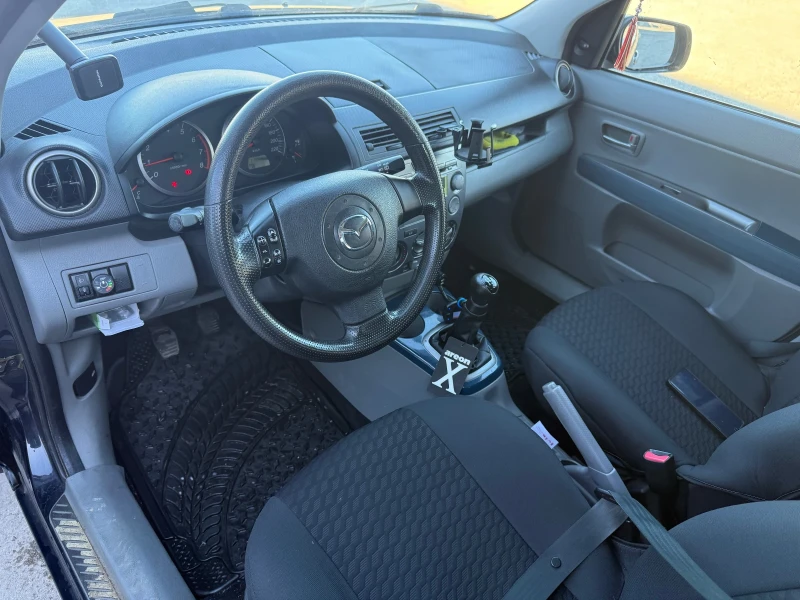 Mazda 2, снимка 10 - Автомобили и джипове - 48447127