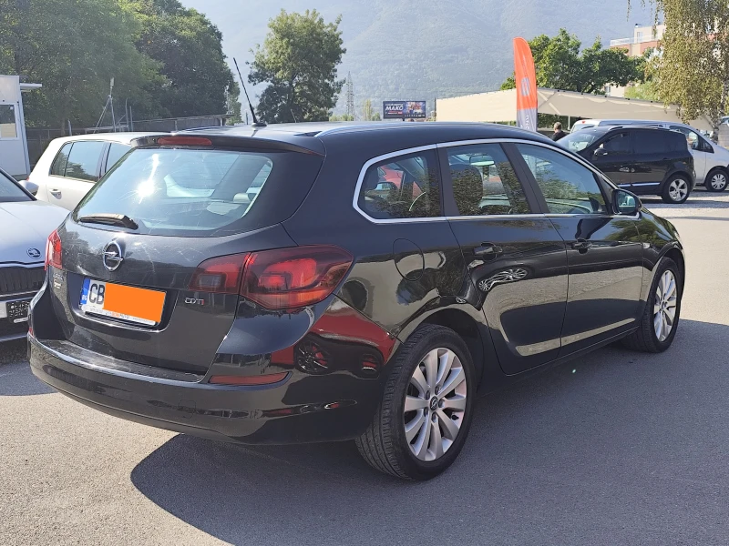 Opel Astra 1.7CDTi* SPORTS TOURER* EURO5A* КЛИМАТРОНИК* , снимка 4 - Автомобили и джипове - 51698724