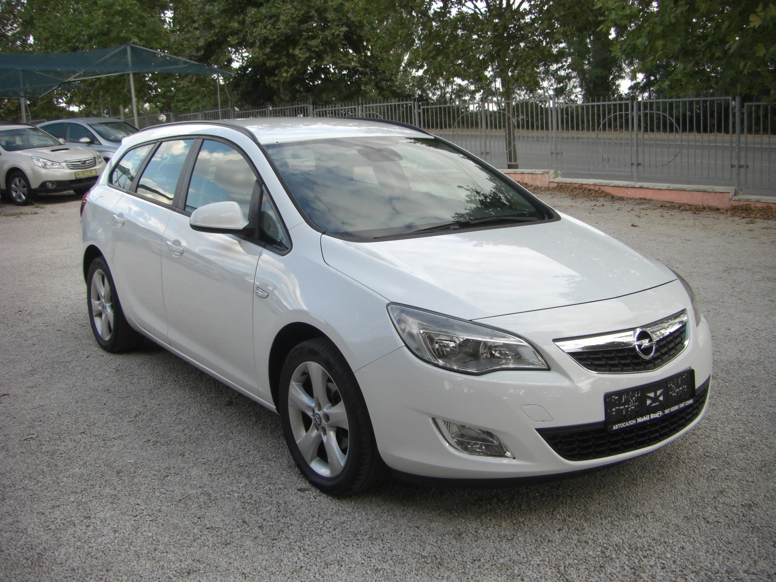 Opel Astra 1.4ib EURO 5, снимка 7 - Автомобили и джипове - 53963076