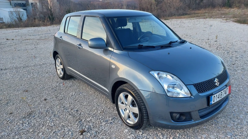 Suzuki Swift 1.3i 4X4 FACELIFT Германия, снимка 3 - Автомобили и джипове - 48198746