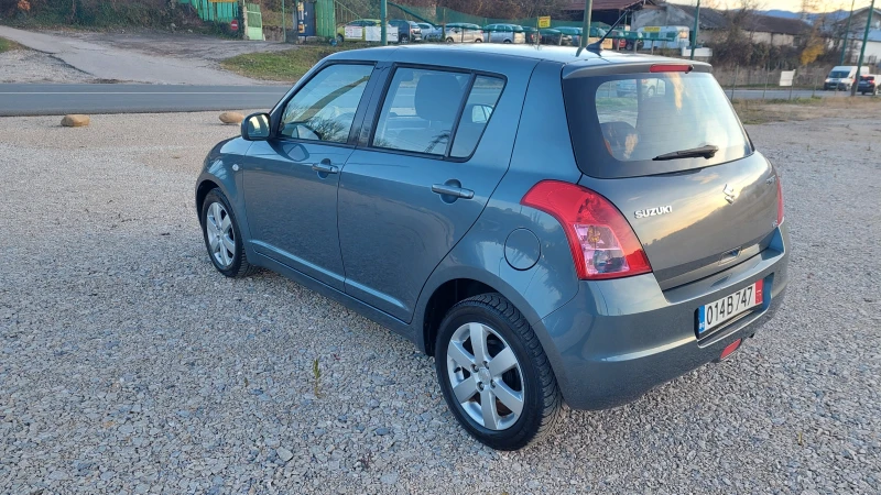 Suzuki Swift 1.3i 4X4 FACELIFT Германия, снимка 6 - Автомобили и джипове - 48198746