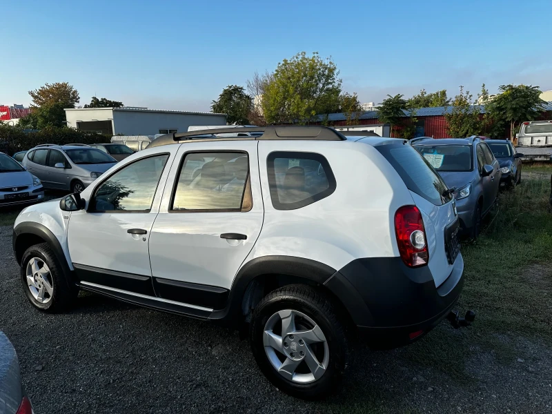 Dacia Duster 1.6 ШВЕЙЦАРИЯ 4х4, снимка 7 - Автомобили и джипове - 47357399