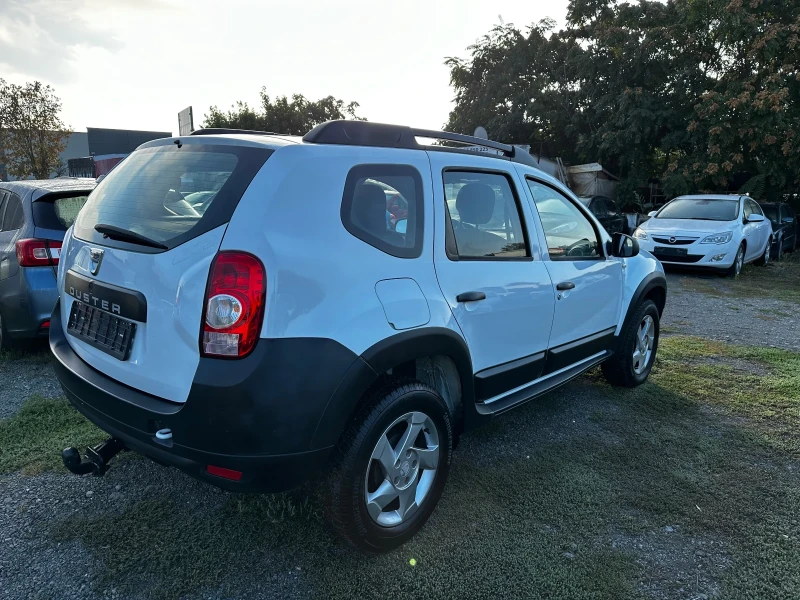 Dacia Duster 1.6 ШВЕЙЦАРИЯ 4х4, снимка 4 - Автомобили и джипове - 47357399