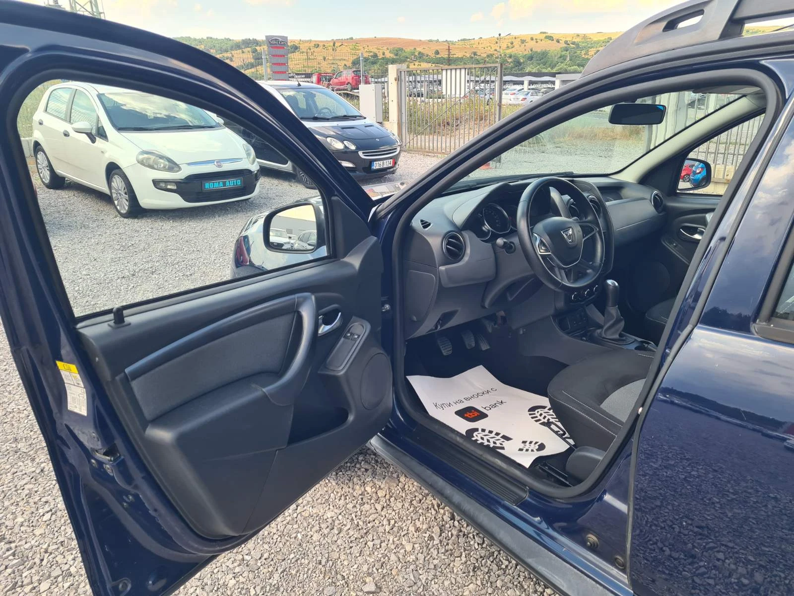 Dacia Duster  1.6i GPL/NAVI/KAMERA/EURO 6B, снимка 11 - Автомобили и джипове - 55508606