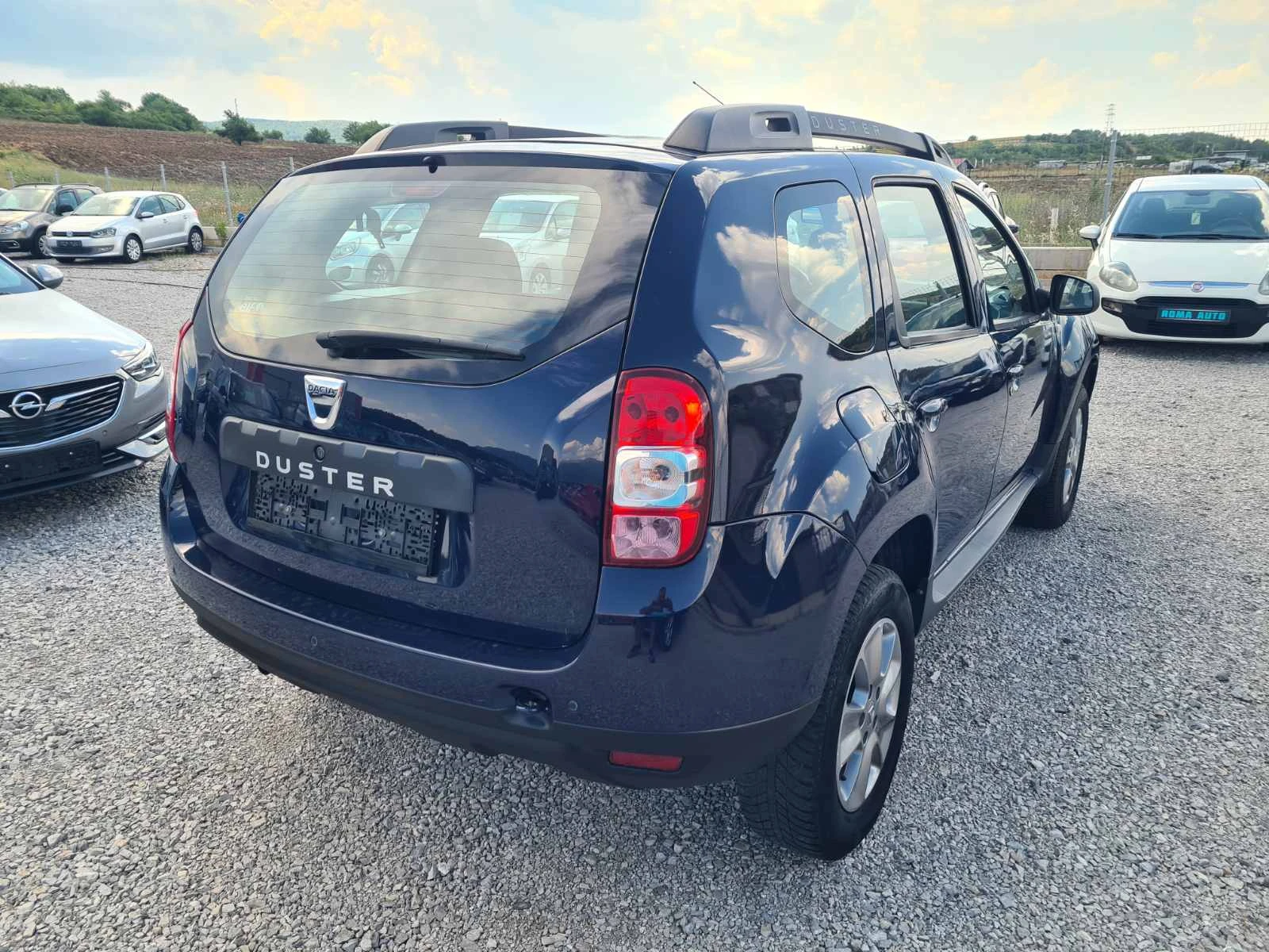 Dacia Duster  1.6i GPL/NAVI/KAMERA/EURO 6B, снимка 4 - Автомобили и джипове - 55508606