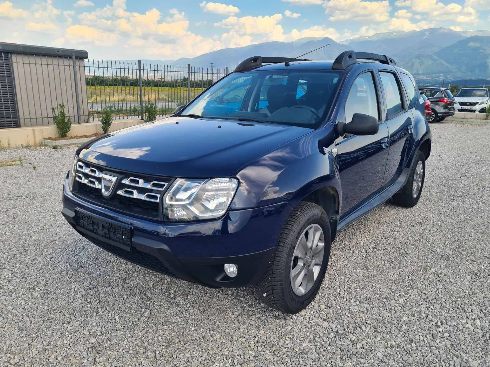 Dacia Duster  1.6i GPL/NAVI/KAMERA/EURO 6B, снимка 17 - Автомобили и джипове - 55508606