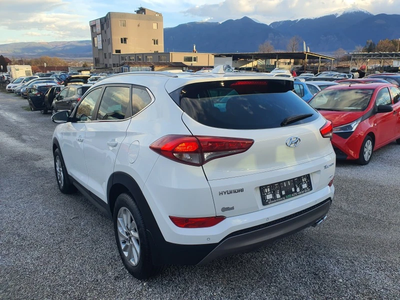 Hyundai Tucson 2.0CRDI 4WD NAVI AVTOMAT, снимка 7 - Автомобили и джипове - 46354873