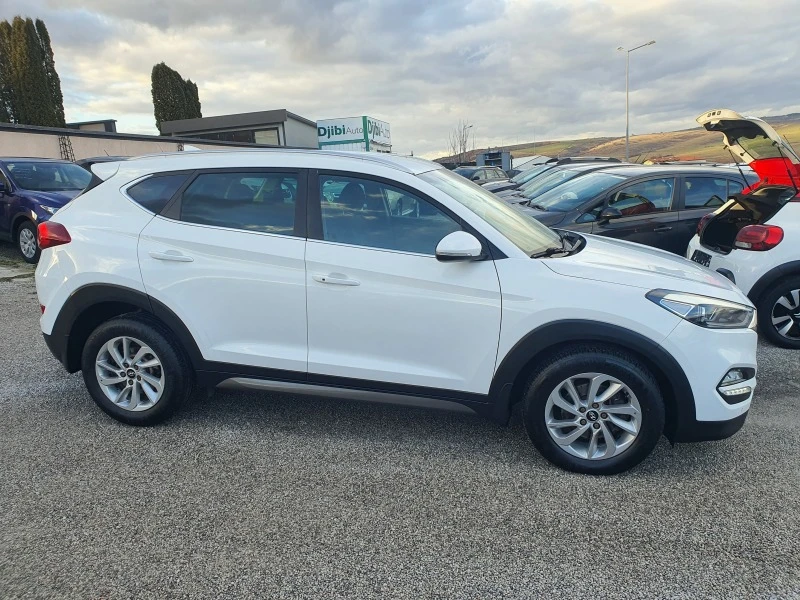 Hyundai Tucson 2.0CRDI 4WD NAVI AVTOMAT, снимка 4 - Автомобили и джипове - 46354873