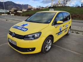 VW Touran 1.6 TDI DSG Автопилот/Кожа/Мултиволан/Печка - 6200 € / 12126.15 лв. - 98063788 2