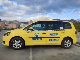 VW Touran 1.6 TDI DSG Автопилот/Кожа/Мултиволан/Печка - 6200 € / 12126.15 лв. - 98063788 5