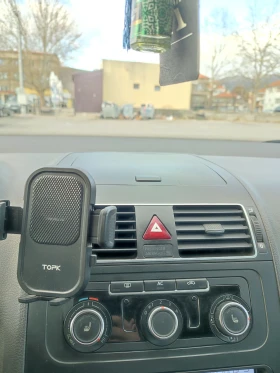 VW Touran 1.6 TDI DSG Автопилот/Кожа/Мултиволан/Печка - 6200 € / 12126.15 лв. - 98063788 11