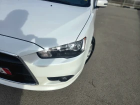 Обява за продажба на Mitsubishi Lancer УНИКАЛЕН/КЛИМАТРОН/МУЛТИВОЛАН/1.6i ~12 799 лв. - изображение 1