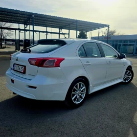 Обява за продажба на Mitsubishi Lancer УНИКАЛЕН/КЛИМАТРОН/МУЛТИВОЛАН/1.6i ~12 799 лв. - изображение 4